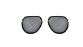 A pair of geometric sunglasses with a black frame, dark gray lenses, and gold metal bridge and temple tips, shown against a plain white background.