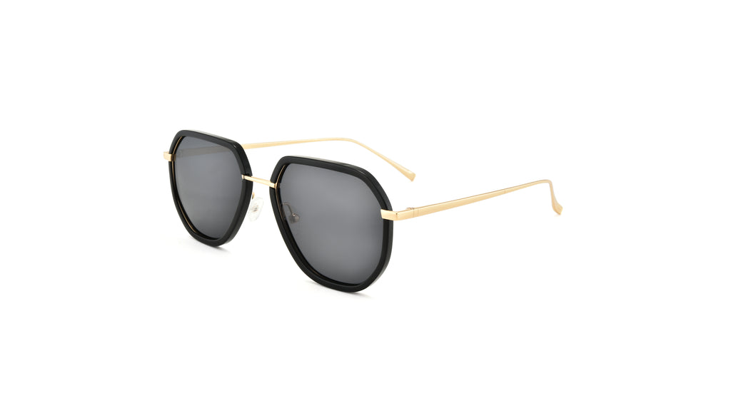 A pair of modern angular sunglasses with black frames, dark gray lenses, and gold metal temples, shown on a plain white background.