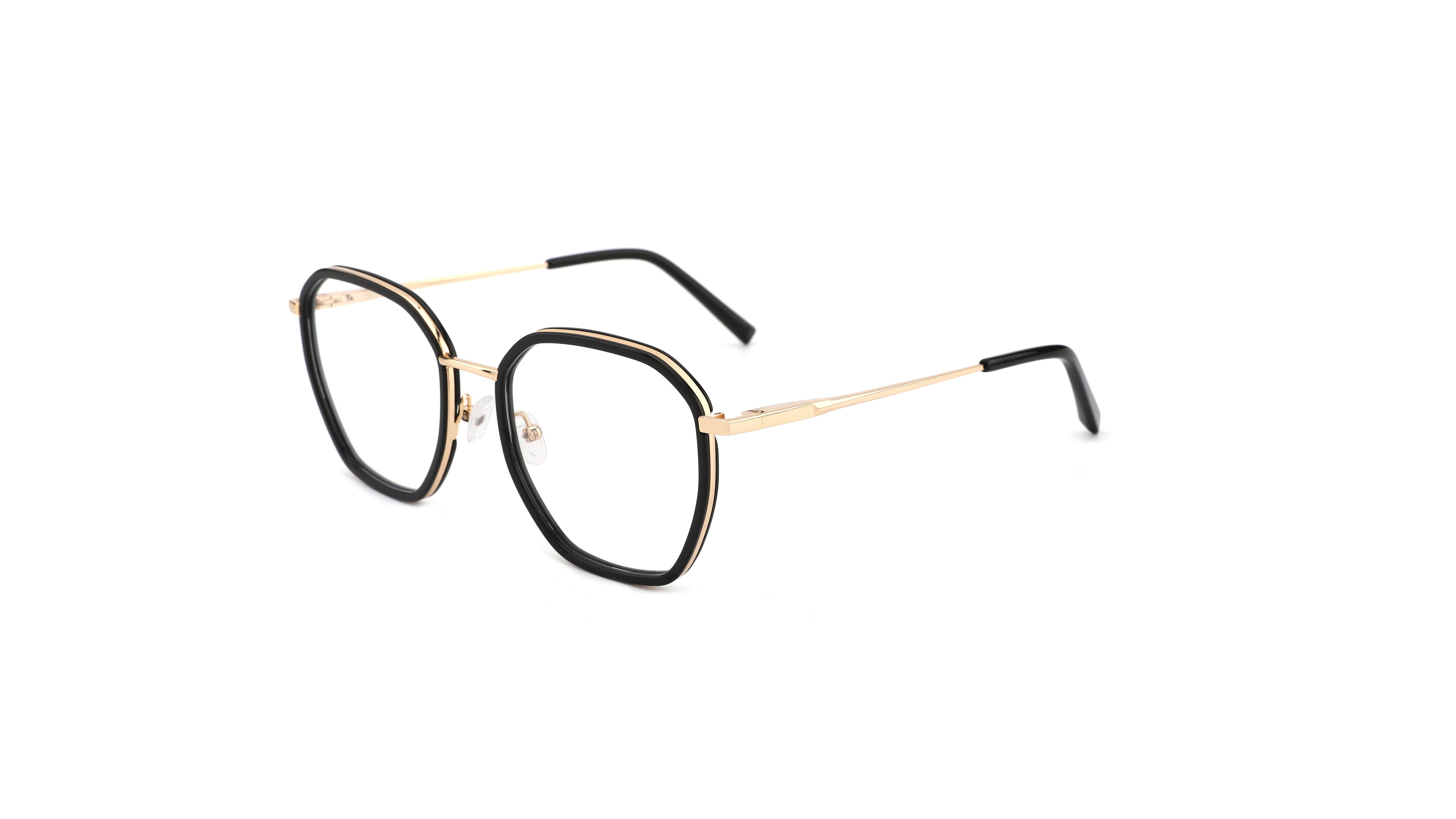 Oversized geometric eyeglasses with black acetate frames, gold metal rims, and gold temples, shown on a plain white background.
