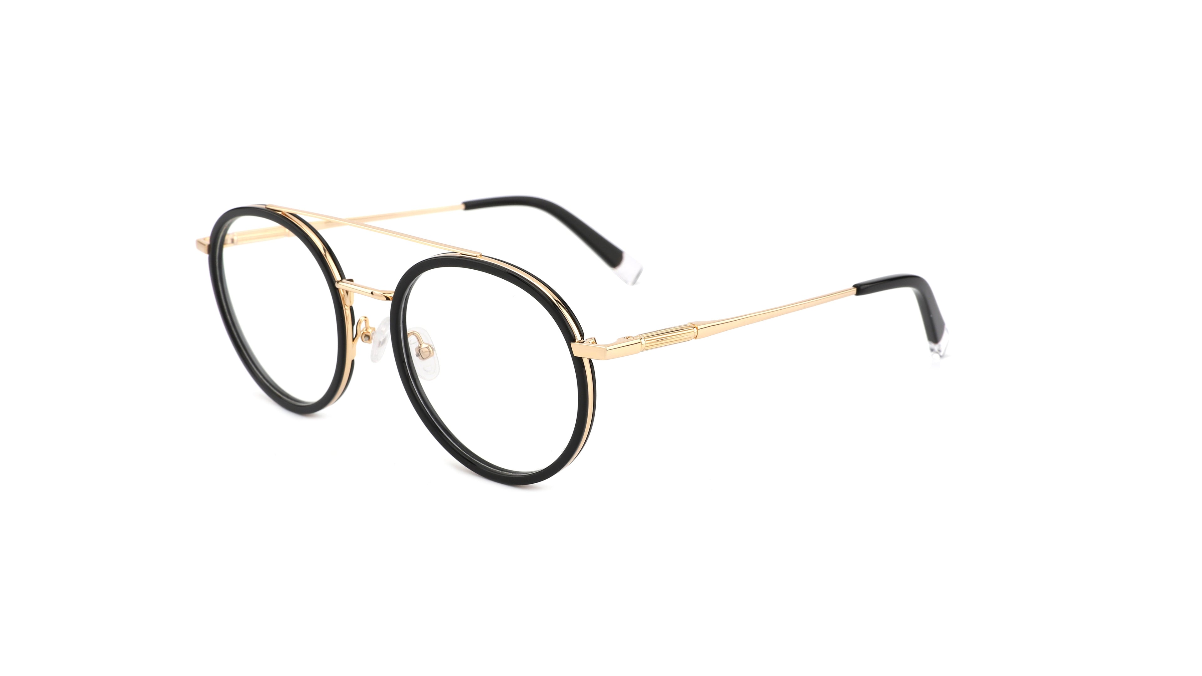 Oversized round eyeglasses with gold metal rims, black acetate outer rims, and gold-toned temples with black tips, shown on a plain white background.