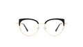 Oversized round eyeglasses with a black top half and gold bottom half, shown against a plain white background.