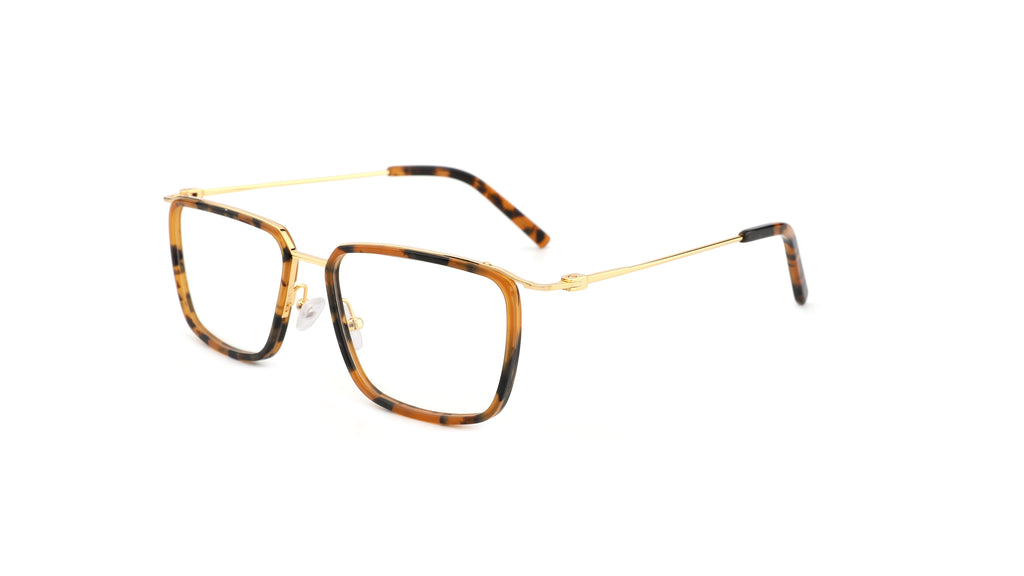 A pair of square-frame eyeglasses with a tortoiseshell pattern and gold metal rims, shown on a plain white background.