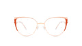 Oversized round eyeglasses with a thin rose gold metal frame and orange-red temples, shown against a plain white background.