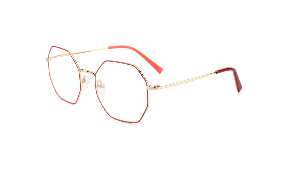 Oversized hexagonal eyeglasses with a thin gold metal frame and reddish-brown acetate trim, shown on a plain white background.