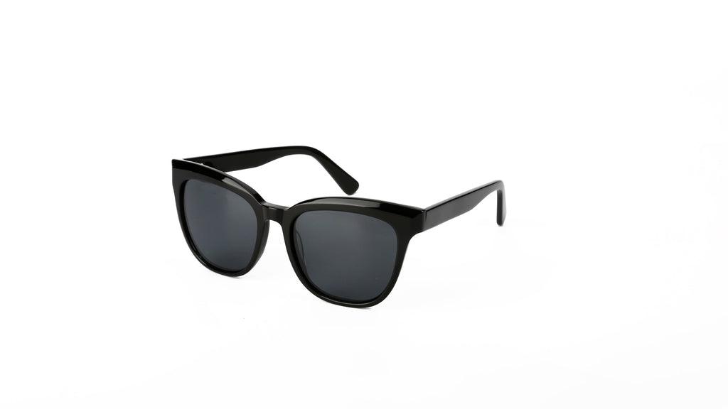 Black cat-eye sunglasses with dark lenses, shown at a three-quarter angle on a plain white background.