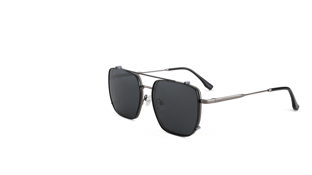 A pair of square aviator-style sunglasses with dark gray lenses and a thin silver metal frame, shown from a three-quarters angle on a solid white background.