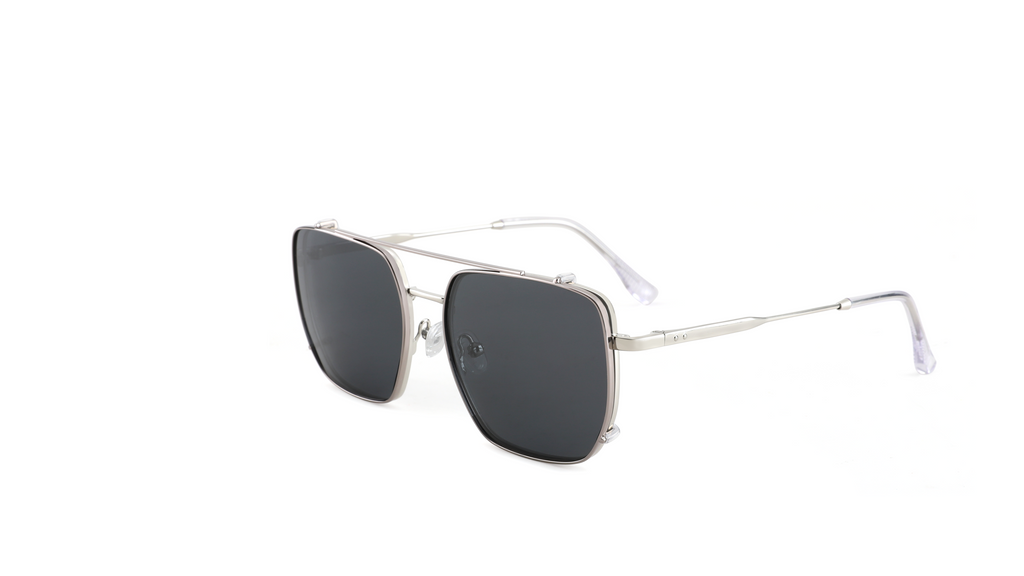 A pair of square aviator-style sunglasses with a silver metal frame and dark gray lenses, shown from a three-quarters angle on a plain white background.