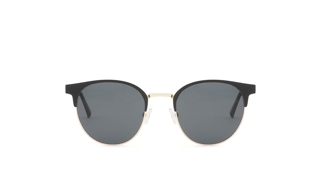 A pair of classic round-frame sunglasses with dark gray lenses and thin gold metal rims, centered on a plain white background.