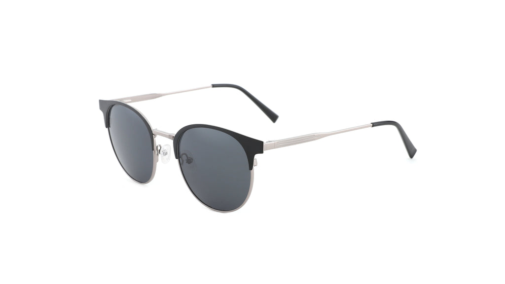 Oval sunglasses with a black acetate front, silver metal bridge and temples, and dark gray lenses, shown on a plain white background.
