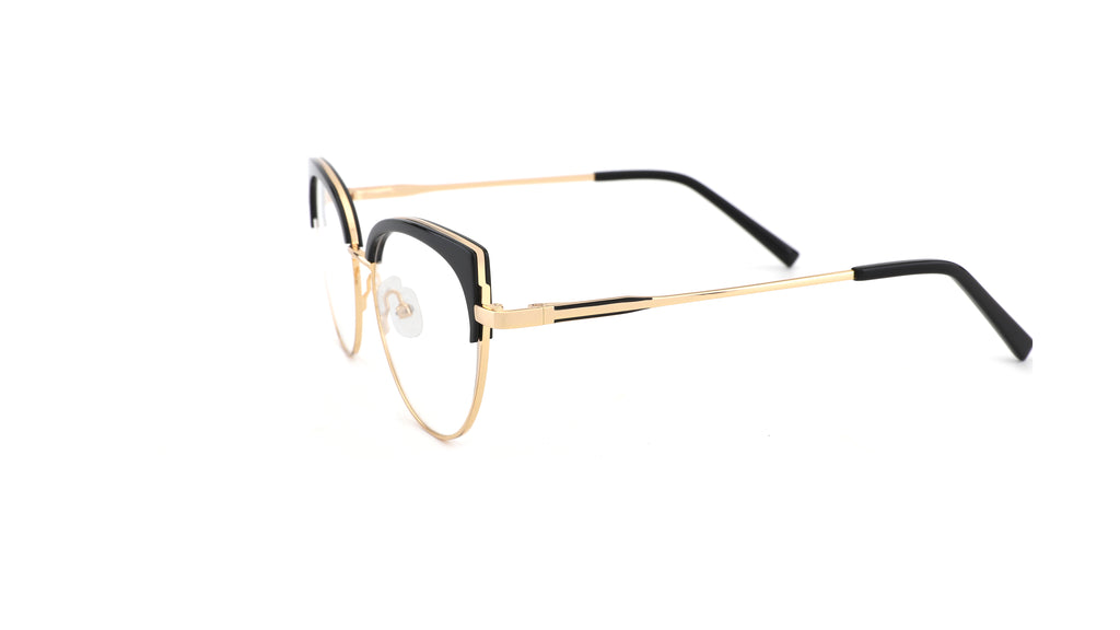 A pair of cat-eye style eyeglasses featuring a gold metal frame with black acetate detailing around the lenses and black temple tips, shown on a plain white background.